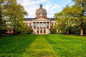 Rochester, NY, USA - May 19, 2016: University of Rochester Library. There are 158 buildings house in the University of Rochester, more than 200 academic majors, more than 2,000 faculty and instructional staff, and some 11,300 students—approximately half of whom are women.